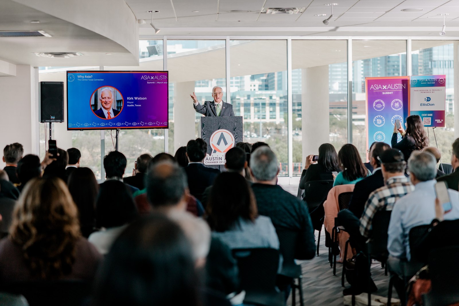 A speaker addressing the audience at Asia X Austin.