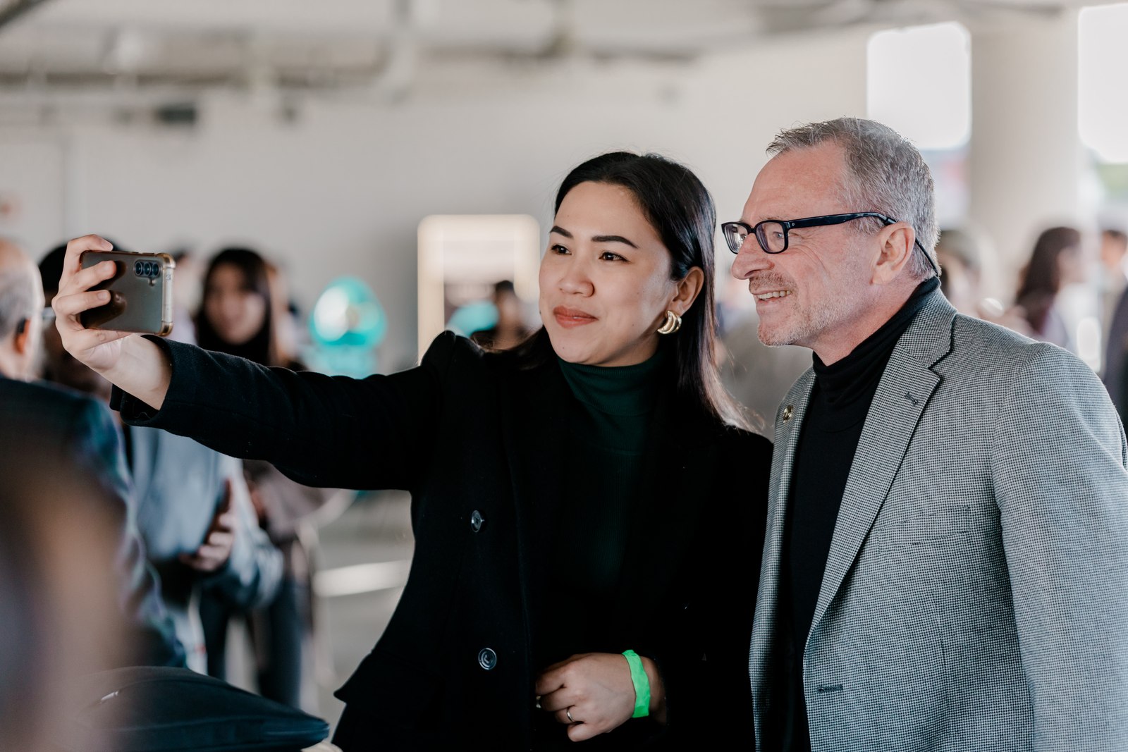 Guests capturing a shared moment at Asia X Austin.