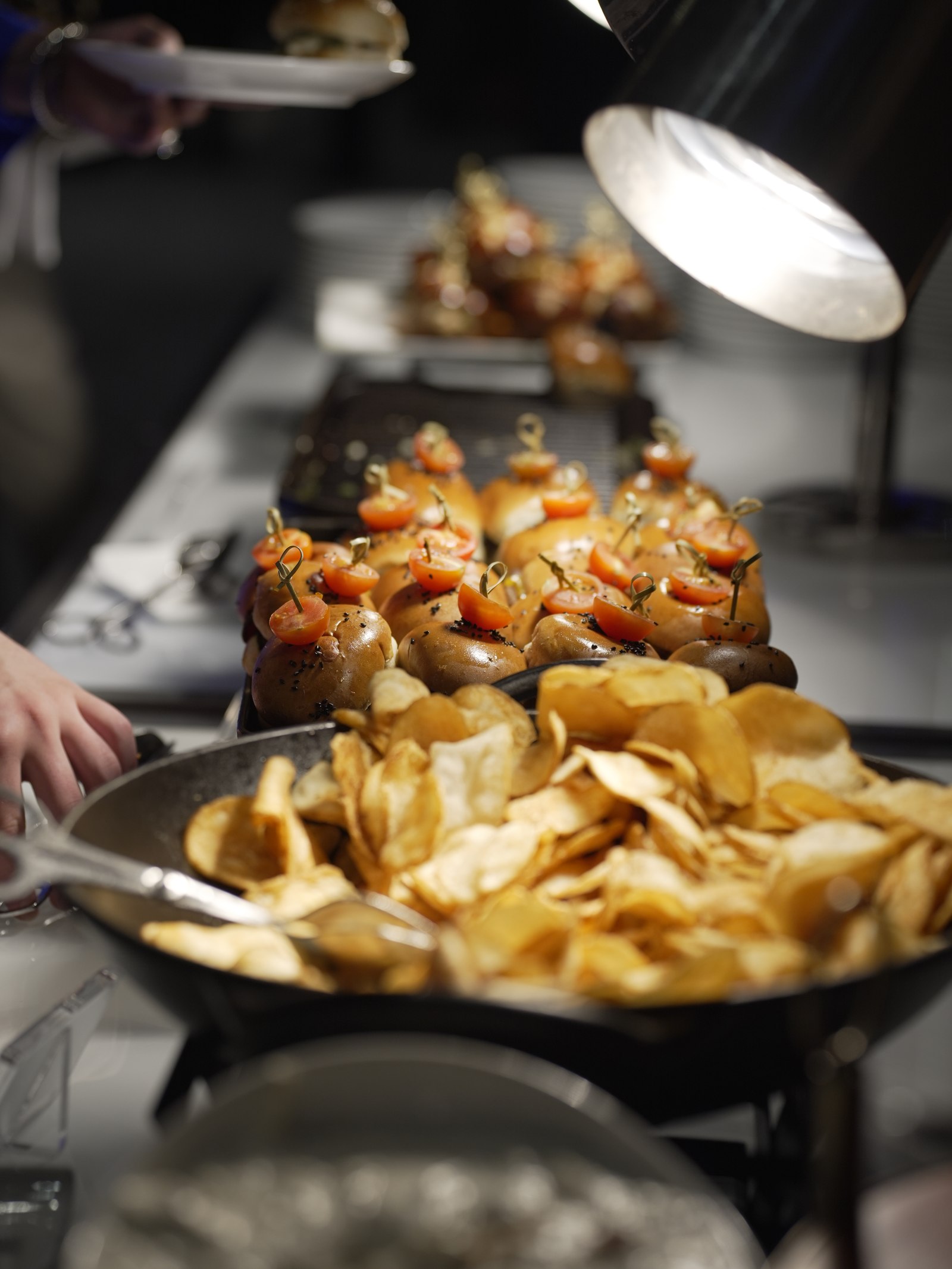 A carefully arranged spread of prepared bites and fresh food for guests.