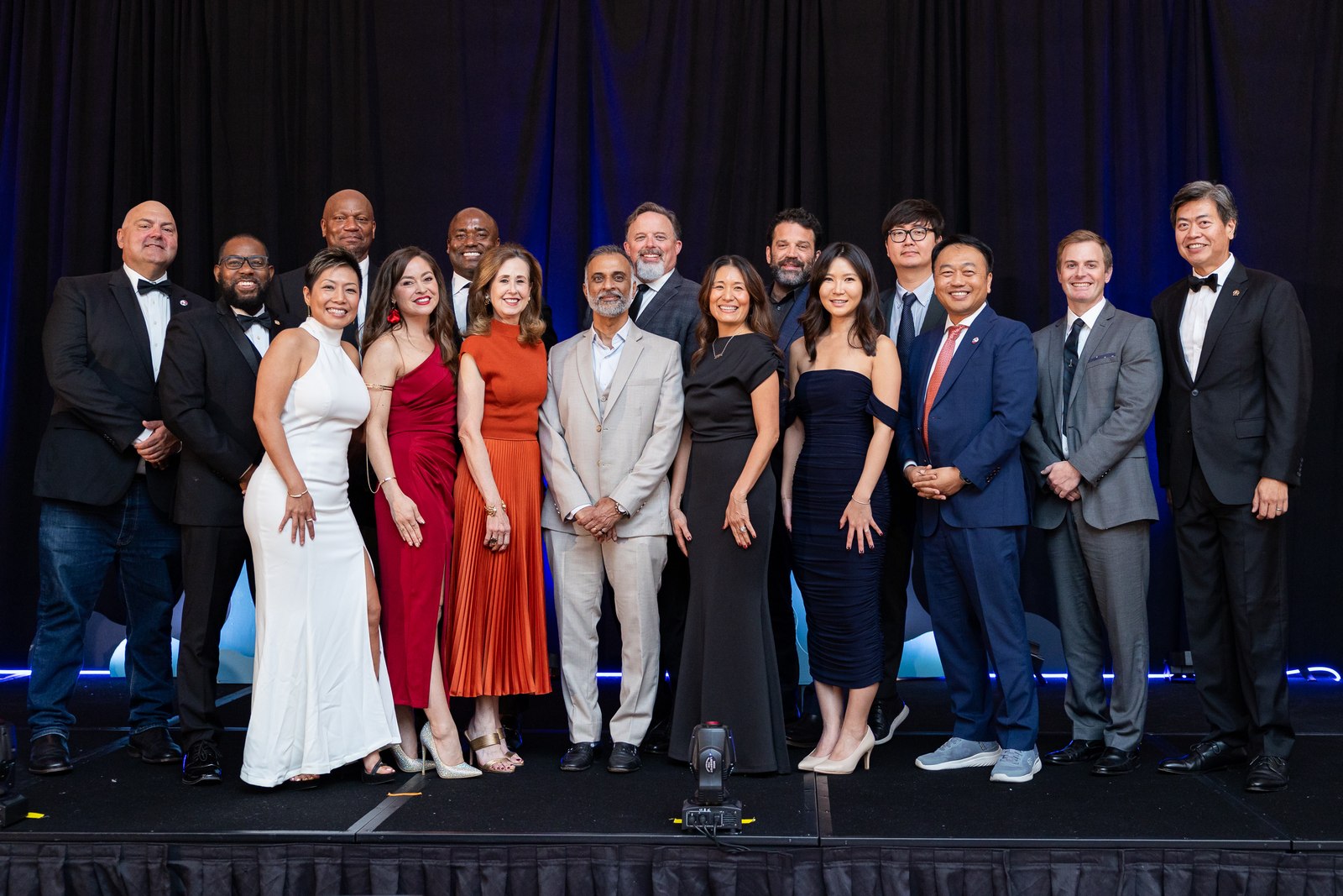 A group celebrating together at the Ovation Gala.